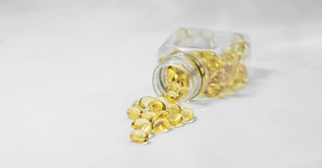 A selection of the best vitamin D3 supplement UK 2026 bottles on a clean white surface, showcasing different brands and formulations.