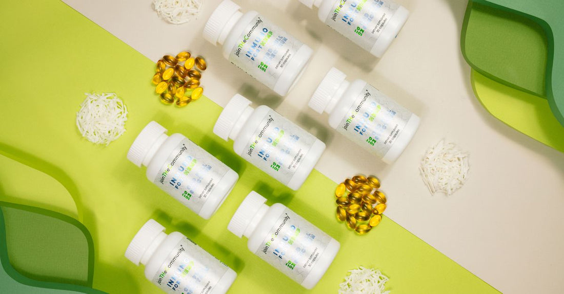 A bottle of vitamin D3 softgels next to a glass of water on a wooden table, illustrating the best time to take vitamin D3 with a meal for optimal absorption.