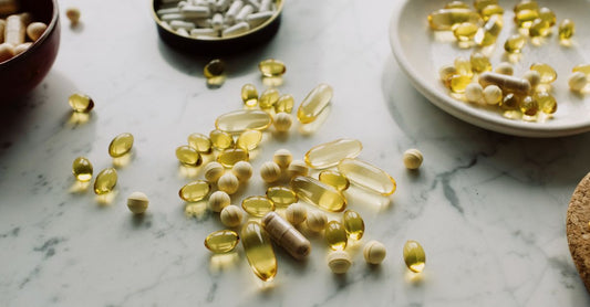 Vitamin D3 supplement capsules in a white bottle on a clean surface, illustrating how much vitamin D3 should I take daily