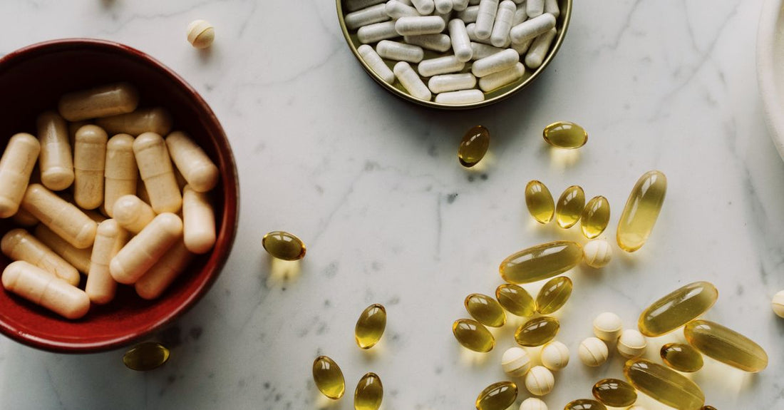 Ozemburn Pro supplement capsules in a white bottle on a clean surface, showing the Advanced Formula label.