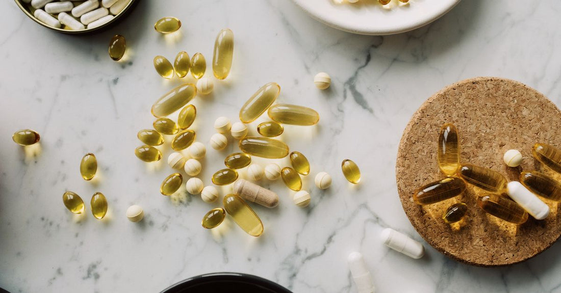 A bottle of Cell Forte Max 3 capsules on a clean surface with a glass of water, representing a simple daily supplement routine.