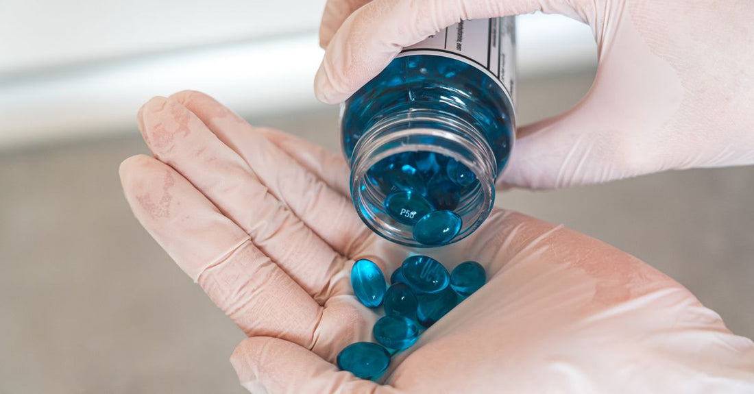 Two bottles of sciatica capsules on a clean surface, comparing nerve health supplement options.