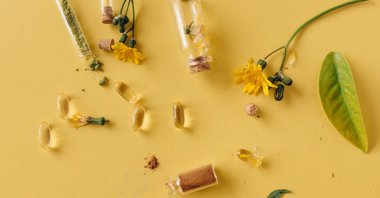 Ukvital meds: a flatlay of assorted supplement bottles and capsules, representing the curated range at Ukvitalityvitamins.