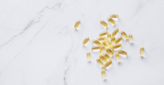 Caltrate UK calcium supplement tablets in a bottle, highlighting bone health benefits.