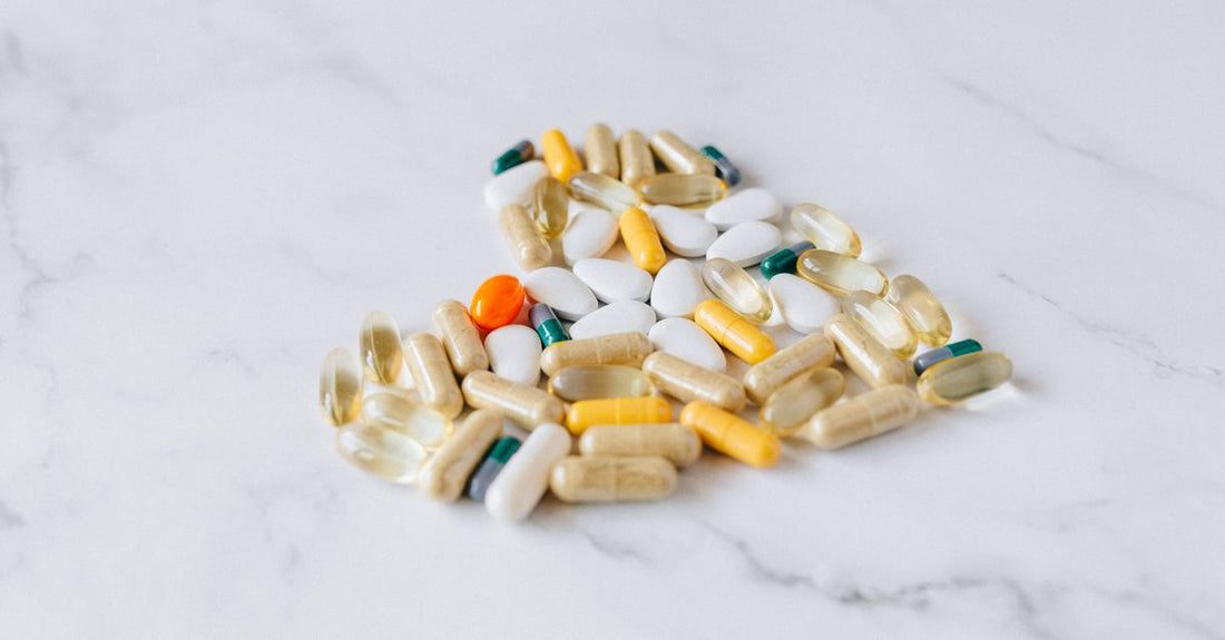 Multivitamin for men over 50 with organic whole foods – bottle of capsules on a clean surface