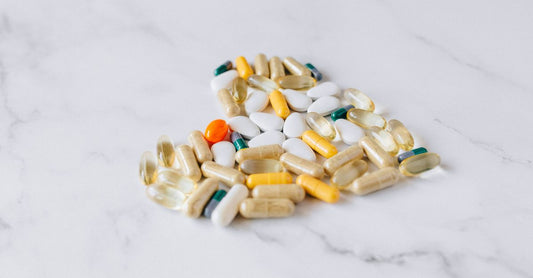 Multivitamin for men over 50 with organic whole foods – bottle of capsules on a clean surface
