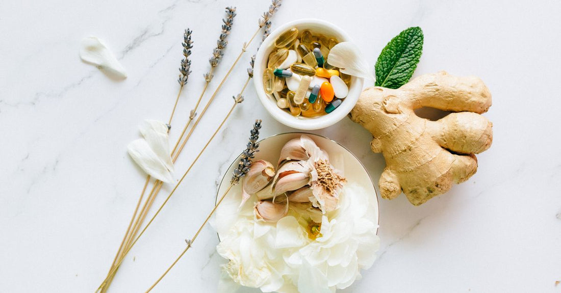 A flatlay of gut-health foods including fermented vegetables, whole grains, and supplements representing the Viva Mayr diet principles.